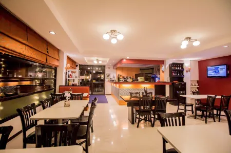 The Red Palm Suites and Restaurant Отели рядом с Аэропорт Банкаси