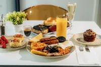 Regency Suites - Desayuno