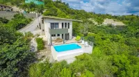 Big, Ultramodern Hillside Home with Private Pool and Endless Ocean Views