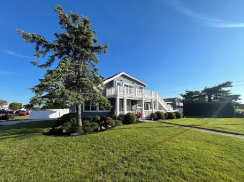 Unbeatable location - 4 houses to beach, 5BR, 3BA, walkability!