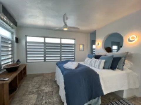 Stunning waterfront, art deco family compound cascading to the water’s edge