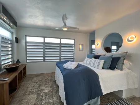 Stunning waterfront, art deco family compound cascading to the water’s edge