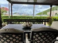Paradise Awaits! Ground level unit with incredible views, pool, & beach access!