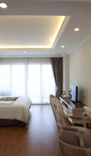 ห้องสวีทเตียงคิงไซส์แบบหนึ่งห้องนอนมีระเบียง