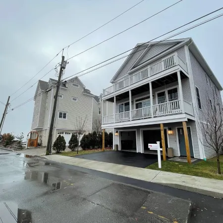 Brand new house with water views just steps from beach!