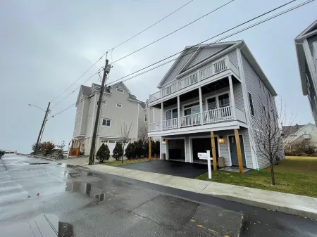 Brand new house with water views just steps from beach!