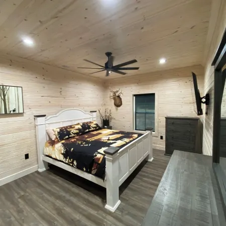 TAKE IT EASY Fishing Cabin. Large enclosed bay for storing the boat.