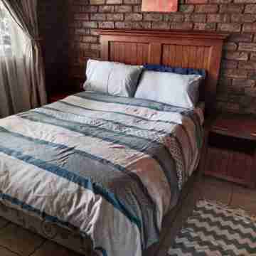 Solar powered cozy family sized cottage with all the privacy you need. Rooms