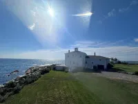 Charming oceanfront retreat, where time slows down and memories are made.