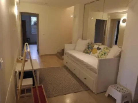 Large apartment in villa with garden and pool