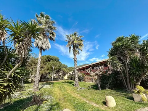 Feet in the water in Corsica Hotels in Alata
