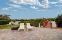 Shovel Sand Not Snow! On the Barrier Island of Indian Shores Florida Hotels near Seaside Seabird Sanctuary