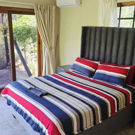 Serene 1-Bedroom Apartment with Garden & Shared Pool
