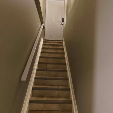 Cozy 2 bedroom basement with 2 beds, kitchen, 75’’ TV and bathroom