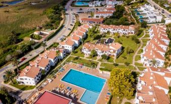 Apartamentos Son Bou Gardens by Menorcarentals - Housity