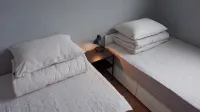 Sh Guesthouse Hotel di 