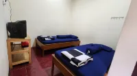 Qiu Guest House Syariah فنادق في Kasiau