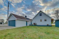 Waterfront Lake City Home w/ Deck & Boat Dock! Hotel di Cadillac