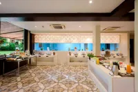 Sea Breeze Sarovar Portico Varca Goa - breakfast