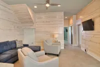 In-town coastal getaway, with a heated pool & level 2 Tesla EV charger on site.