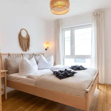 Moderne & Familienfreundliche Ferienwohnung am Goitzschesee Отели в г. Поух