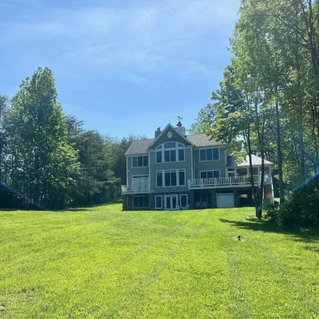 Large Lux Waterfront Home on 9 Acres with Sandy Beach and Beautiful Sunsets