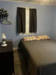 Cute, clean, cozy and pet friendly cottage that is 10 minute walk to the strip.