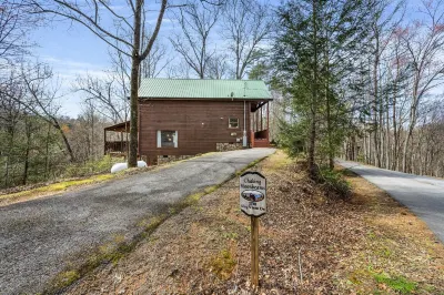 Sunken Hot Tub among Trees, Pool Table, Porch Rocking Chairs