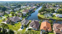 Five Star 3Bd Waterfront Canal Home w/ Private Pool/Spa & Boat Dock.