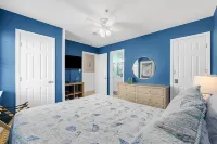 Beach Getaway - First floor unit with Pool and beach access steps away!
