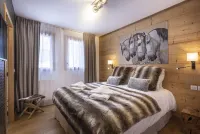 Appart 130m², full services  , 4 bedrooms, 4 bathrooms / d, south balcony and 2 parking spaces Hotels in Montvalezan