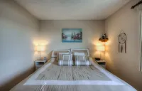 Annie's Ocean Blessing indoor pool hot tub.  Leather recliners, and Ocean views