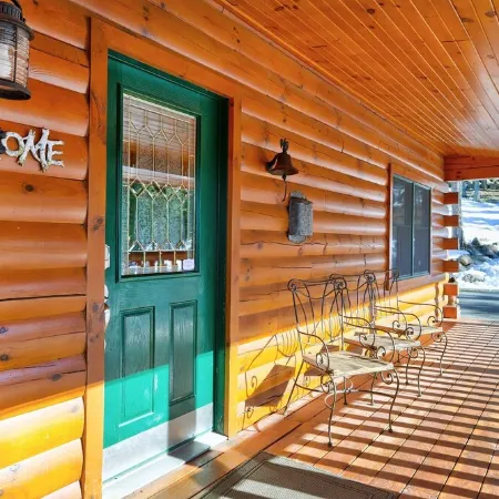 Incredible Views! Stunning log home w/ wrap around deck and covered porch