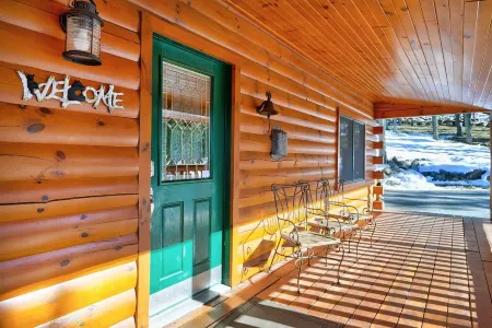 Incredible Views! Stunning log home w/ wrap around deck and covered porch