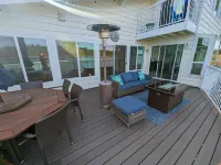 Waterfront Villa with Private Beach, Hot tub, EV & WFH
