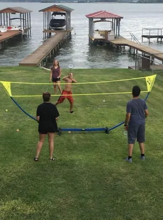 Bright, open concept, lakefront house on open water with amazing sunset views!