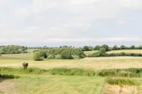 Genießen sie Ihren Urlaub mit Traumhaftem Blick Über die Wiesen Nahe der Schlei Hotels in Grödersby