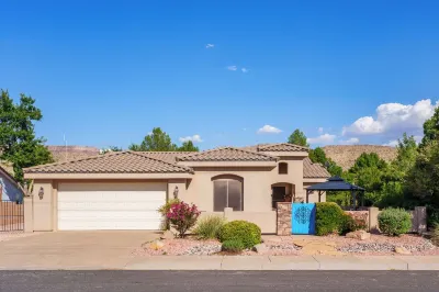 A super variety of games, golf cart & scooter, & unique decor in plush comfort!
