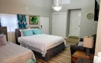 Renovated Suite with 1 queen bed and a Twin. Kitchen & bath for your privacy.