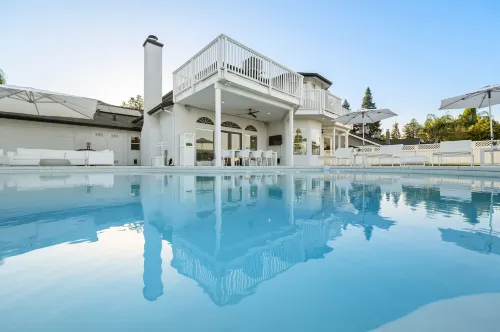 Inspired by the iconic white buildings and turquoise waters of Greece.