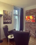 Vacation apartment with balcony overlooking the spa gardens of Bad Rothenfelde Hotels in Bad Rothenfelde