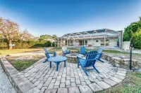 Tropical oasis on the water. Heated pool w. lots of family amenities & games