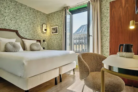 Hotel Joséphine by HappyCulture Paris Отели рядом с достопримечательностью «Мулен Руж»