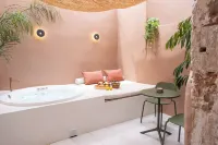 Qualia Slowlife Suites - Kylpyammeita