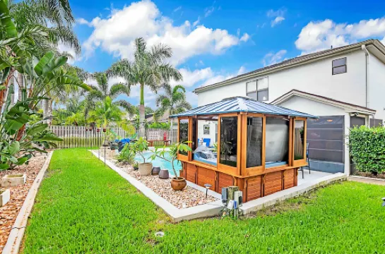 Urban Oasis W/Hot Tub, Heated Pool and Private Movie Theater 2 Bedroom Home by RedAwning