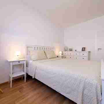 Few Steps from the Sandy Beach Rooms