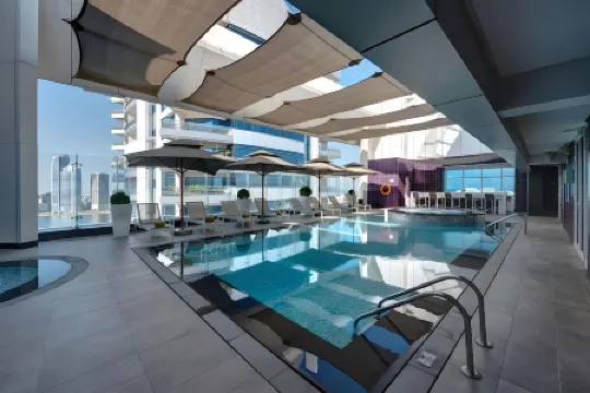 The Act Hotel Sharjah Отели рядом с достопримечательностью «Аль-Маджаз набережной»