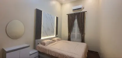 Homestay Zhafira Hotels near PodoMoro Copy & Print