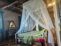 Room in Guest Room - Colobus Suite of 40m2 in Villa 560 m2, View of the Indian Ocean فنادق في Shimoni