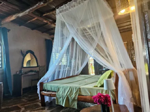 Room in Guest Room - Colobus Suite of 40m2 in Villa 560 m2, View of the Indian Ocean Hotels in 